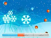 Jingle Balls Christmas game screen showing a snow attack freezing Christmas baubles and elves to create a chain reaction online free