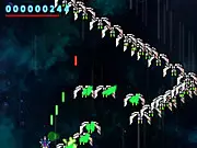 Dead-Metal free online game screenshot - A metallic spaceship fighting alien vessels in a dark, planetary orbit around Earth.