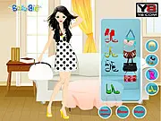 Play Polka Dots Dress Up game free online. Image of a fashionable model wearing a stylish outfit with a polka dot pattern.