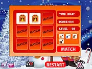 Christmas Perfect Match memory game screenshot - A grid of flipped and unflipped Christmas-themed tiles