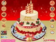 Yummy Christmas Cake Decor free online baking game showing a festive cake decorated with red frosting and holiday candies on PlayArcadeHub