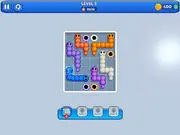 Snake Out puzzle game screenshot showing colored snakes waiting to enter holes