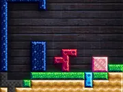 The character next to a large chunk block on a platform in the puzzle-platformer game Chunkster.