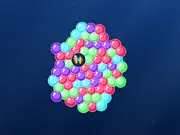 Screenshot of Ocean Pop Bubbles game, showing colorful bubbles floating in a vibrant blue underwater environment ready to be matched and popped.