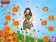 Fairy of Happiness dress up game image, featuring a magical sprite with pink wings and a sparkling gown, spreading joy online