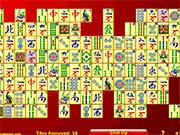 The game board for Shi Sen Mahjong, showing a grid filled with Chinese character and symbol tiles ready to be matched using the two-turn connection rule.