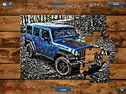Screenshot of the Wrangler Jeep Black Bear Jigsaw online puzzle game, showing a partially completed image of the black Jeep Wrangler.