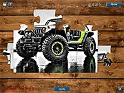 Jeep Trailcat jigsaw puzzle game screenshot showing a red Jeep Trailcat vehicle being completed from scattered pieces, free online puzzle game