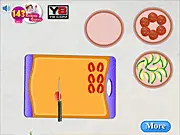 New Year Pizza Cooking free online game screenshot – girl preparing dough and toppings for pizza