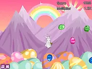 Easter Dreaming free online game screen, showing the Easter Bunny jumping and collecting colorful eggs in a dream-like platformer level