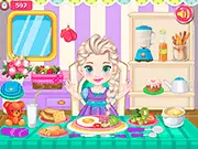 Baby Elsa happily holding a brightly colored, perfectly organized bento box filled with various adorable miniature foods, representing the free Baby Bento Box Rush game.