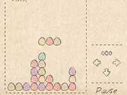 Doodle Eggs Match 3 game screenshot showing colorful, cartoon eggs lined up on a puzzle grid, play free online matching game