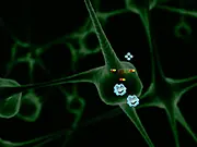 Screenshot of Antibiotic Chain Reaction game showing a glowing antibiotic sphere impacting a cluster of green bacteria to start a destructive chain reaction - play free online