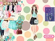 Screenshot of Mint Colors Dress Up game showing a young lady styled in a fashionable outfit made entirely of cute mint and pastel colors - play free online