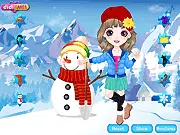 Screenshot of Make a Happy Snowman game showing Misty in winter clothes standing next to a fully decorated, smiling snowman