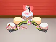 Sweet Wedding Cake Design free game screenshot of a multi-tiered decorated cake