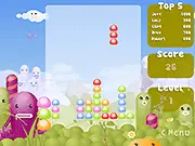 Gameplay screenshot of the free puzzle game Hoppin' Pop showing colorful, cartoon-like creatures arranged in falling columns.