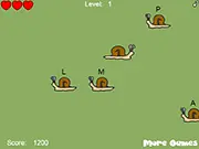 Screenshot of Snail Invasion typing game showing several snails advancing on a garden with single letters floating above their shells