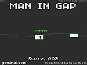 Man in Gap free online game screenshot, showing a small character trying to navigate a narrow safe space between fast-moving deadly blocks.