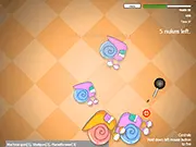 The Snail Shooter game interface showing a player character aiming a gun at several slow-moving snails, play free online.