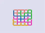 Screenshot of Fit-It Side online game, showing various colored geometric puzzle pieces needing to be fitted into a large grey outline.
