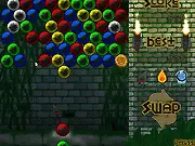 Temple Pop free online game screenshot showing groups of colorful balls connected by a line on a mystical temple background.