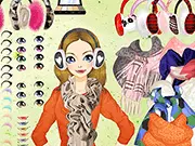 A girl wearing a stylish winter outfit and a pair of colorful, fluffy ear muffs in the Cute Ear Muffs free online game.