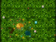 Screenshot of Bomber Blastic online game showing a chain reaction explosion with multiple bombs and blocks on the level map