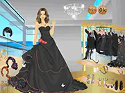 Free online dress up game Lady in Black Dressup showing a female model posing in a classic, elegant black gown.