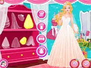Super Princess Wedding Day game screenshot showing the blonde princess trying on a beautiful white wedding dress and applying bridal makeup