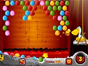Screenshot of Eggs Madness: New Generation, a colorful volcano-themed bubble shooter online game with a duck character