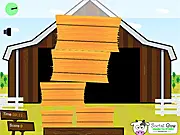 Screenshot of the Haystack game showing various bales of hay stacked precariously on a platform, representing a free online physics and stacking puzzle game.