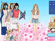 Screenshot of Country Look dress up game, showing a girl model wearing a denim shirt, cowboy boots, and a country-style hat with accessories.