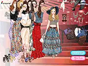 Screenshot of Boho Style dress up game, showing a girl model wearing a flowing, layered bohemian outfit with long hair and accessories.