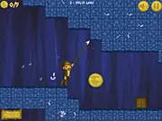 Volcano Idols action game online, showing the hero using a grappling hook to swing over a pit of lava and collect a golden idol