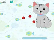 Cat's Yarn Bounce free online skill game where you bounce red yarn balls to keep them in the air