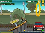 Deadly Feats free online bike stunt game screenshot, motorcycle dodging fire and bombs on a track