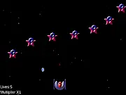 A spaceship or fighter jet shooting projectiles at multiple alien or enemy sprites in the 2D arcade shooter game Z-Fighter