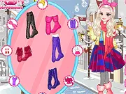 Screenshot of Winter Style Dress Up game showing a girl in a fashionable winter outfit, including a stylish coat and scarf.