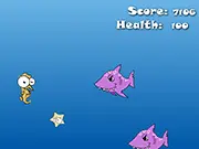 Gameplay screenshot of Fish Frenzy, showing a seahorse character collecting starfish and avoiding a large shark in the deep blue ocean, free online adventure game on PlayArcadeHub.