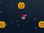 Wolf Pack Halloween Edition free online arcade game screenshot showing a little wolf jumping between platforms while avoiding pumpkins and ghosts
