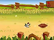 Ronnie the Rooster game screenshot, showing the red rooster jumping over a tire obstacle while collecting corn.