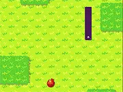 The Hungry Worm Retro Arcade Classic game screen, showing a long purple worm maneuvering across green grass to eat a small red fruit while avoiding hitting its own tail.