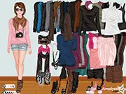 Screenshot of the Pastel Fashion Dress Up game showing a beautiful animated model being styled with a selection of soft pink and blue pastel clothes.