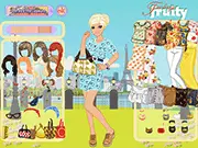 A girl wearing a vibrant, fruit-themed dress and accessories, ready to play the free online fashion game 'Feeling Fruity' on PlayArcadeHub.