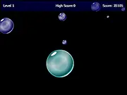 Gameplay screenshot of Bubble Eater showing a large bubble chasing a smaller bubble while avoiding a much larger enemy bubble in the free online arcade game.