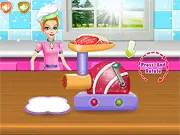 Screenshot of the Grilled Bacon Meatloaf Burger cooking game, showing a finished burger with bacon, cheese, and various toppings on a plate.