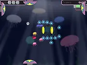 Chilla Bounce arcade game screen showing four paddles surrounding a central area where bouncing chinchillas attack an Evil Sea Monster.