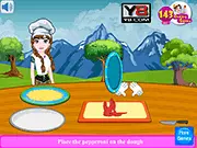 Princess Anna preparing cheesy pizza pinwheels in a cartoon kitchen setting from the online cooking game