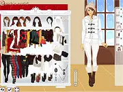 Bundle Up Winter Dress-Up game featuring a girl named Kim wearing layered winter clothing, a scarf, and a hat, free online game